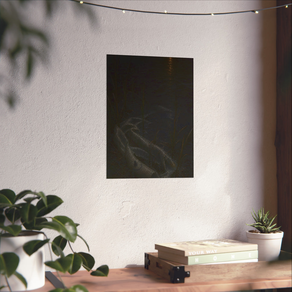 A deflated float slumped in lakeside reeds under a streak of moonlight. Spring Skin in the Reeds by Garabaggio, fine art print hanging in a room.