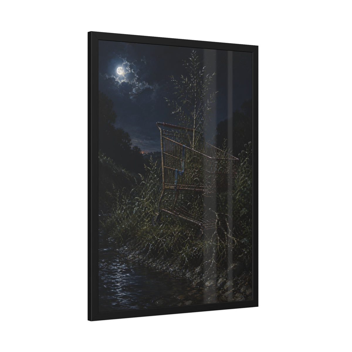A shopping cart in creekside weeds with a sapling growing up through it. The Cart Grown Through by Garabaggio, framed fine art print hanging in a room.
