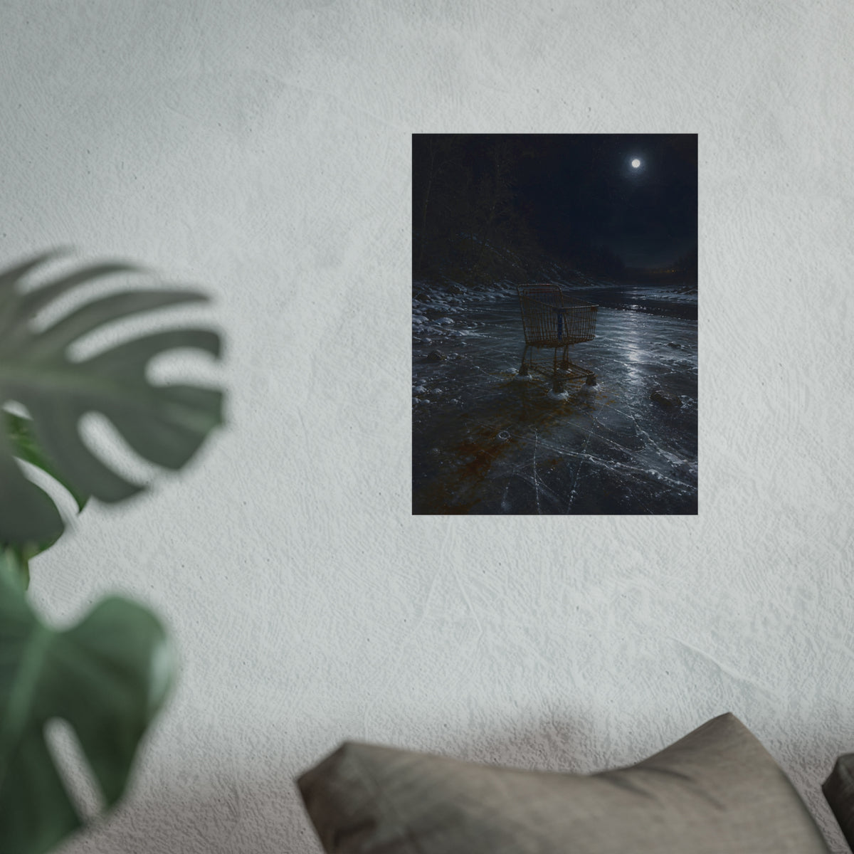 A rusted shopping cart frozen into moonlit river ice. The Wintering in the Ice by Garabaggio, fine art print hanging in a room.