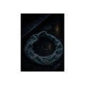 A deflated ring float collapsed on wet pavement under distant amber light. The Freezing of the Smile by Garabaggio, fine art print, 12″ x 16″.