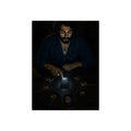 A bearded man at a dark table ringed by phones, one lit screen under his hand. The Congregation of Faces by Garabaggio, fine art print, 12″ x 16″.