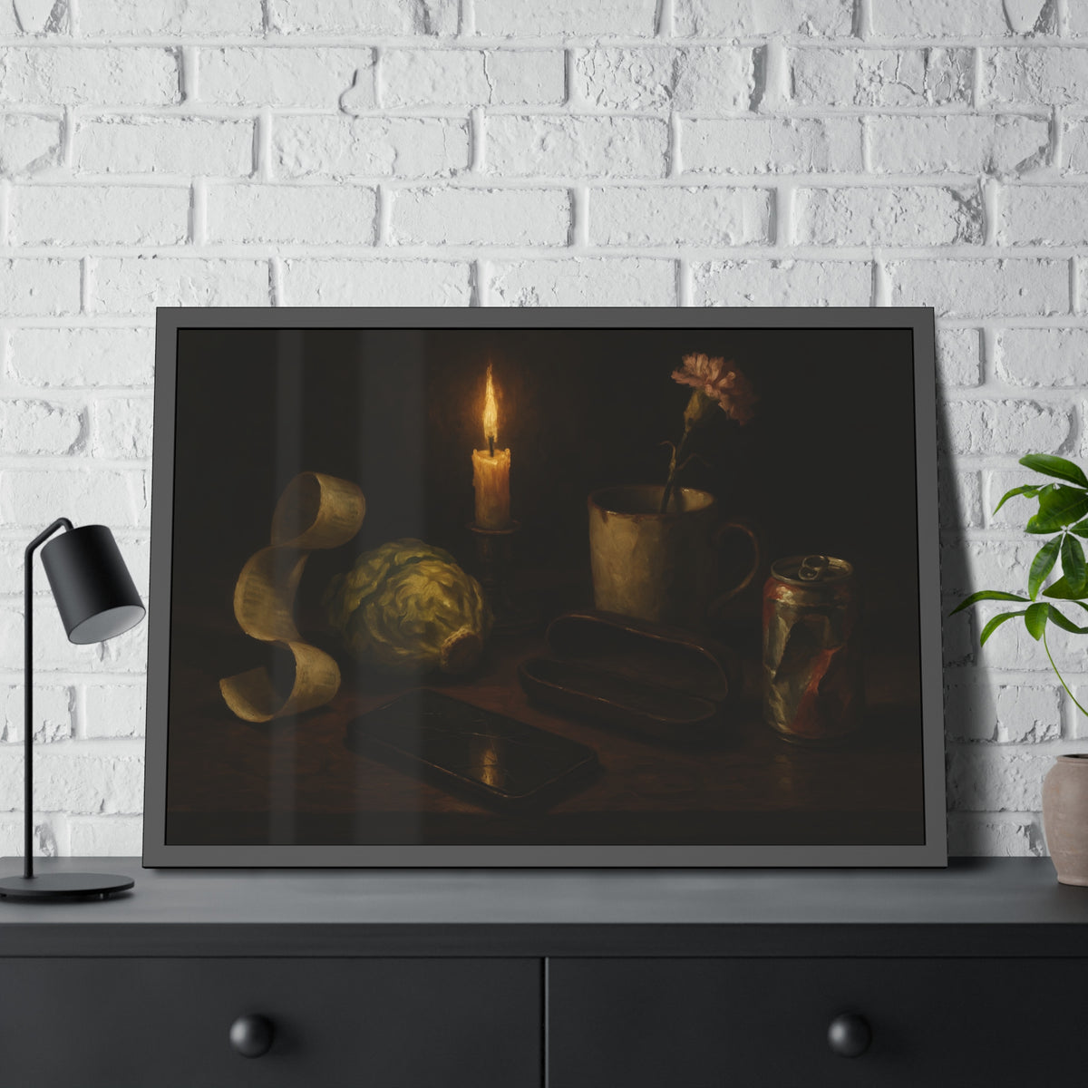 A candle, lettuce head, curled receipt and can on a dim table. Vanitas with Receipts and Wilted Lettuce by Garabaggio, framed fine art print hanging in a room.