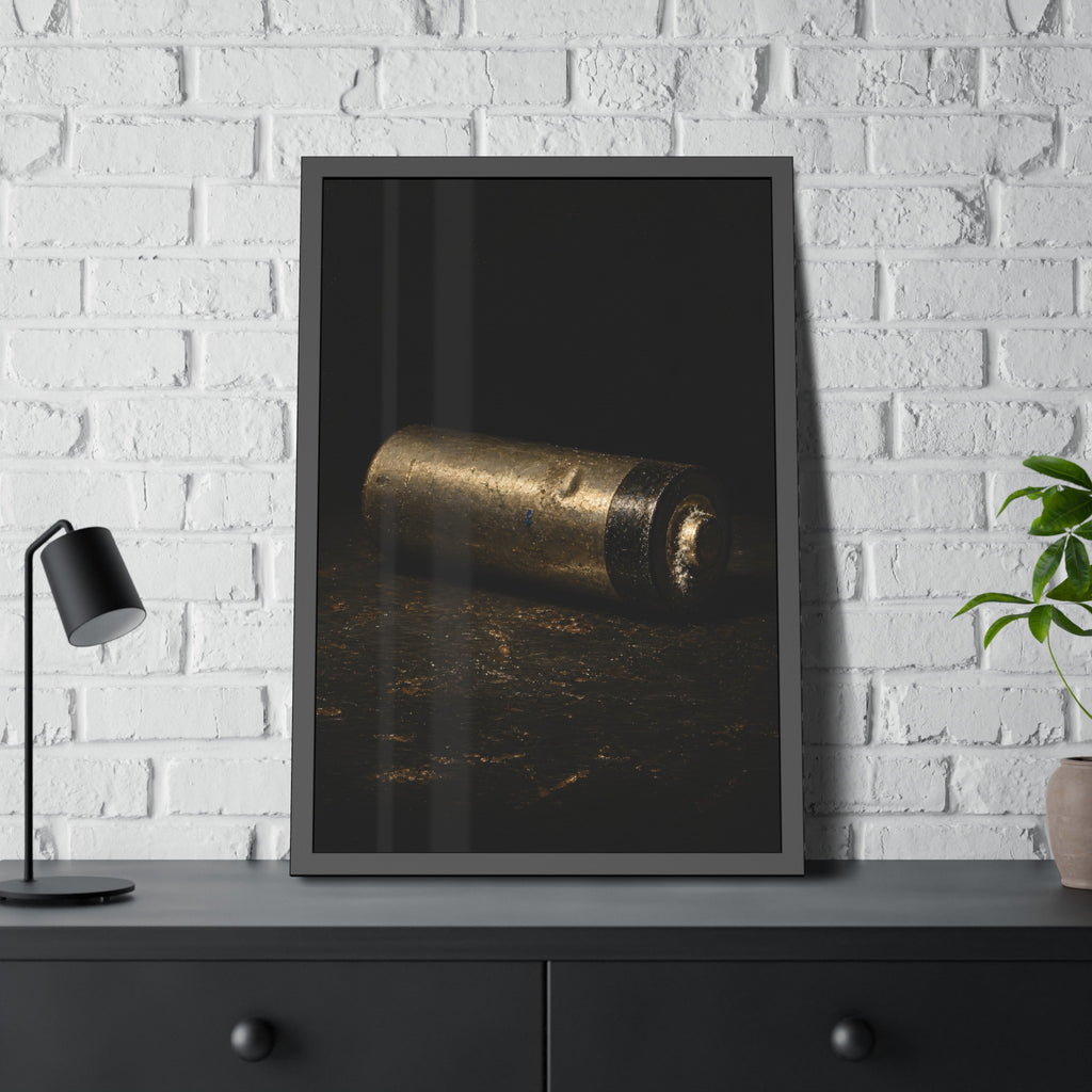 A corroded AA battery lying on a dark gritty surface in a single beam. The First Exhaustion by Garabaggio, framed fine art print hanging in a room.