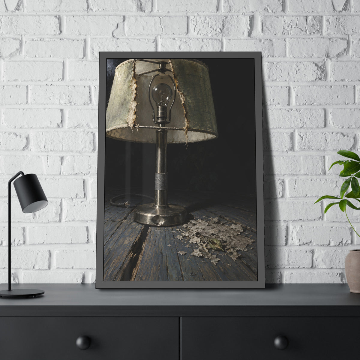 "The Bare Bulb": A Garabaggio Framed Print