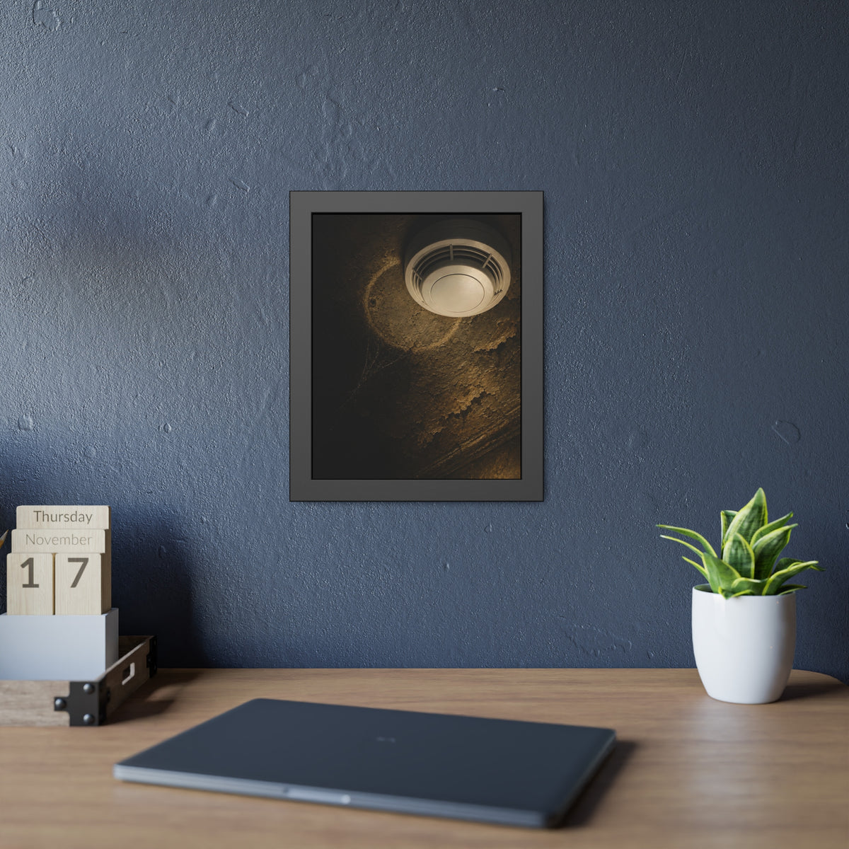 A new smoke detector on a stained ceiling next to an old mounting ring. The New Detector by Garabaggio, framed fine art print hanging in a room.