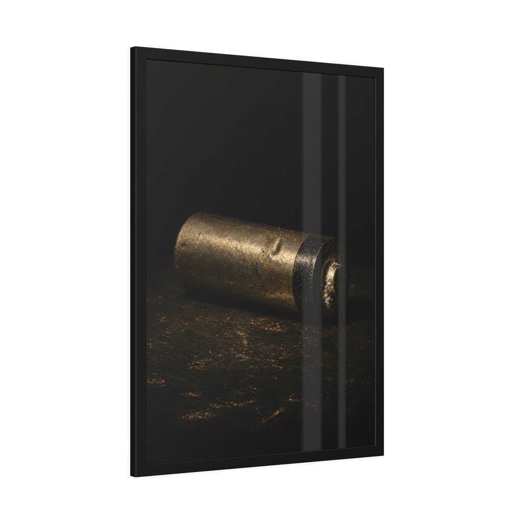 A corroded AA battery lying on a dark gritty surface in a single beam. The First Exhaustion by Garabaggio, framed fine art print hanging in a room.