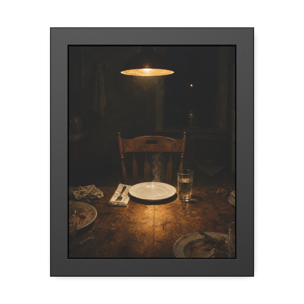 A clean plate and empty chair under a hanging lamp at a used dinner table. The Empty Seat at Dinner by Garabaggio, framed fine art print, 11″ x 14″.