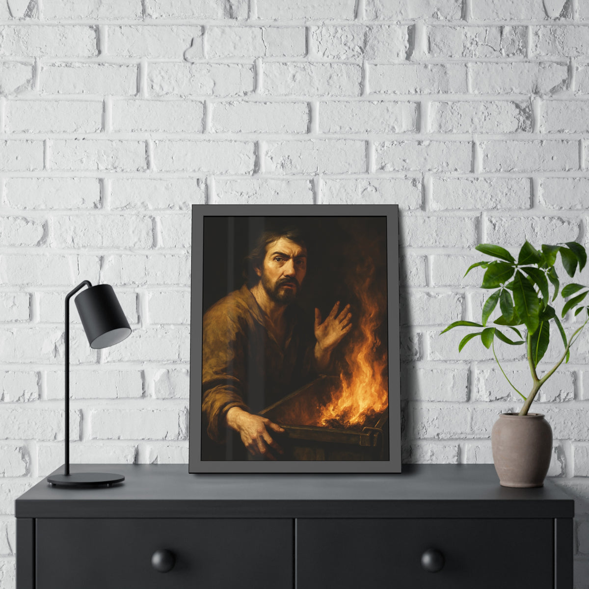 Man gripping the edge of a burning dumpster with one hand raised. Self-Portrait at 3:40 AM by Garabaggio, framed fine art print hanging in a room.
