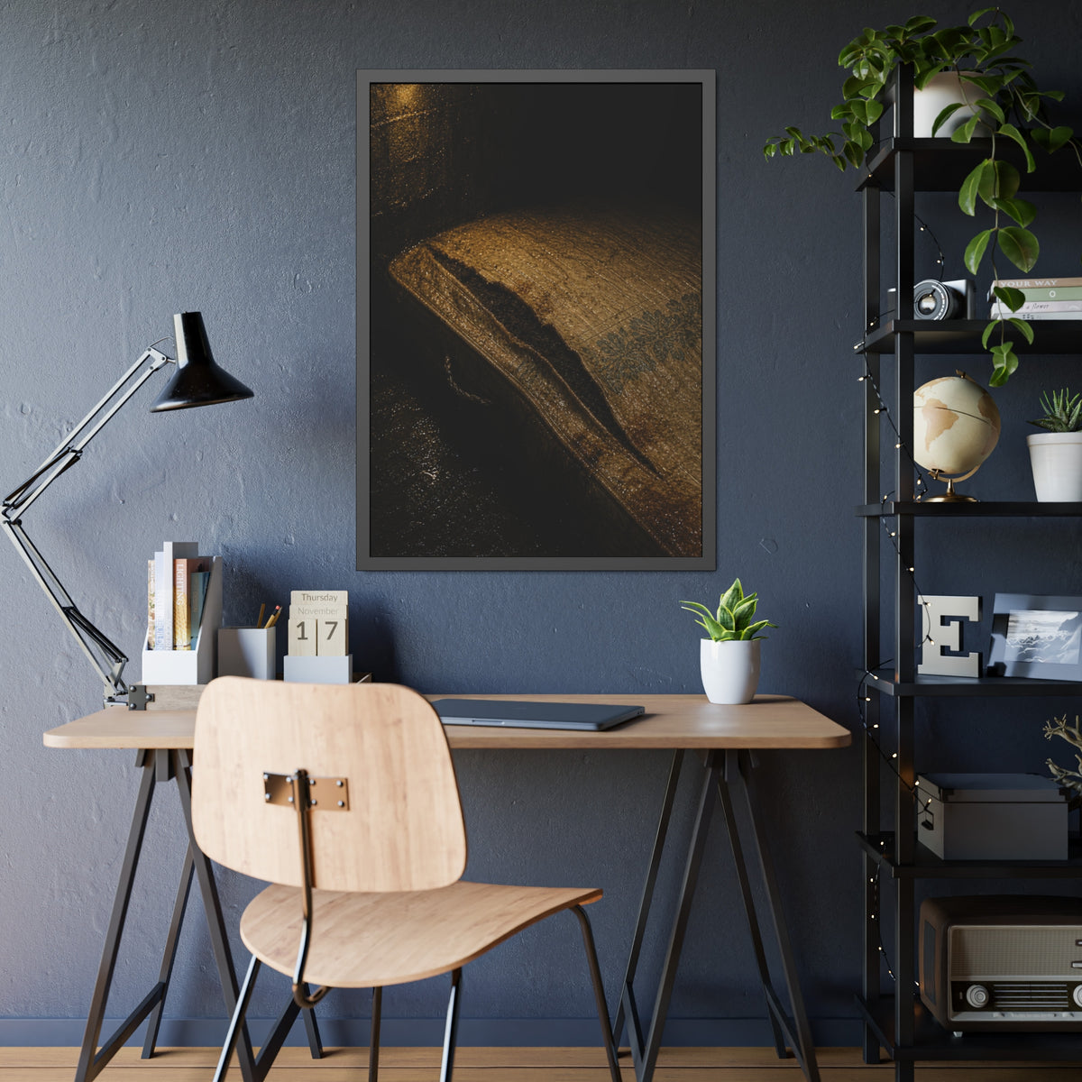 A mattress with its seam split open, lit warm against a dark wall. The Opening of the Ticking by Garabaggio, framed fine art print hanging in a room.