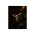 A scorched toaster resting on a heap of scrap appliances in dim light. The Arrival at Scrap by Garabaggio, fine art print, 12″ x 16″.