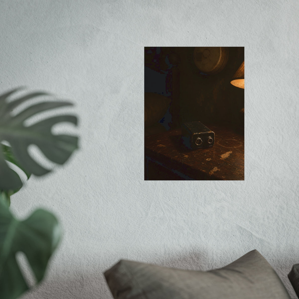 A nine volt battery on a nightstand below a wall smoke detector. The Battery Laid Below by Garabaggio, fine art print hanging in a room.