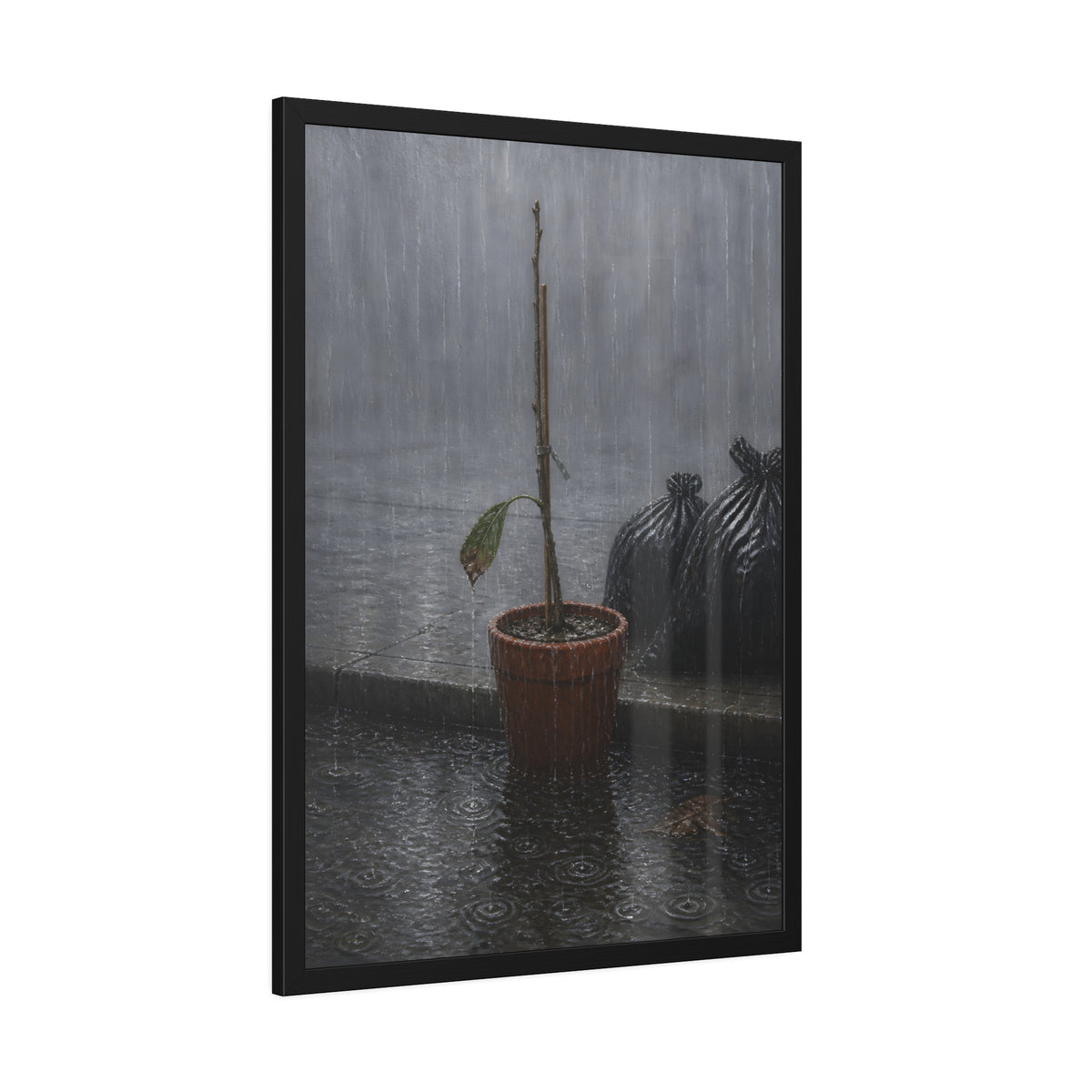 A bare stick in a clay pot on a curb in heavy rain beside trash bags. The Second Rain by Garabaggio, framed fine art print hanging in a room.