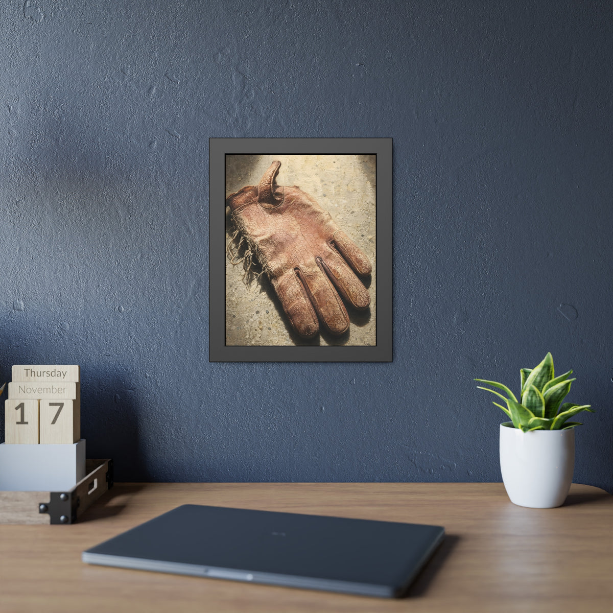 A cracked leather work glove lying on bright sunlit concrete. The Bleaching, Study of a Sun-Tired Glove by Garabaggio, framed fine art print hanging in a room.