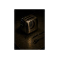 A scorched toaster on a metal table beside its severed cord and plug. The Severing of the Cord by Garabaggio, fine art print, 12″ x 16″.