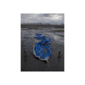 Collapsed blue tarp roped between two posts on wet cracked ground. Collapse Under Wind by Garabaggio, fine art print, 12″ x 16″.