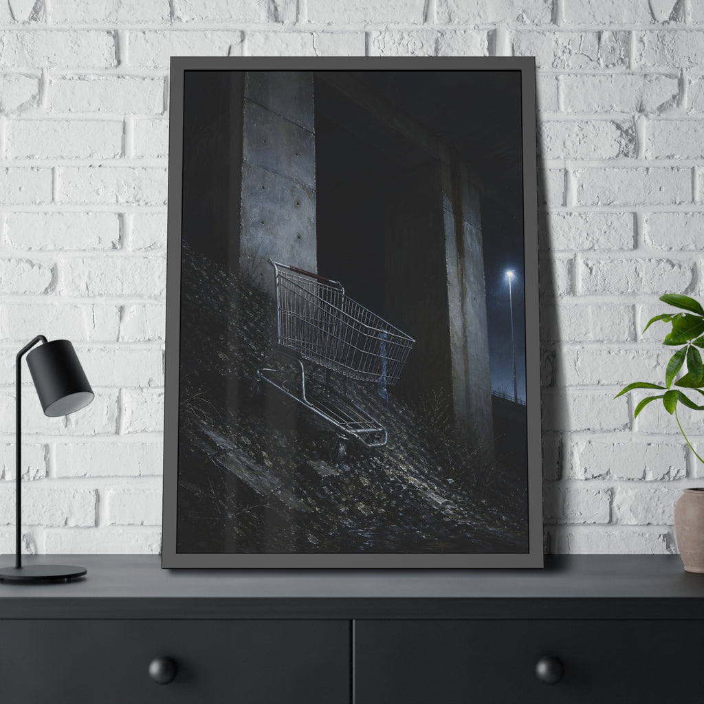 A shopping cart on a rocky slope under an overpass near a streetlamp. The Descent to the Underpass by Garabaggio, framed fine art print hanging in a room.