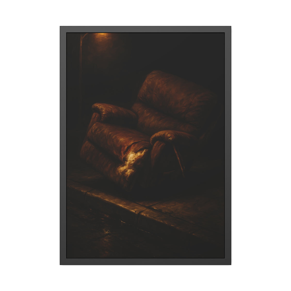 A torn brown recliner tipped on a curb in dim warm light. The Deposition of the Broken Recliner by Garabaggio, framed fine art print hanging in a room.
