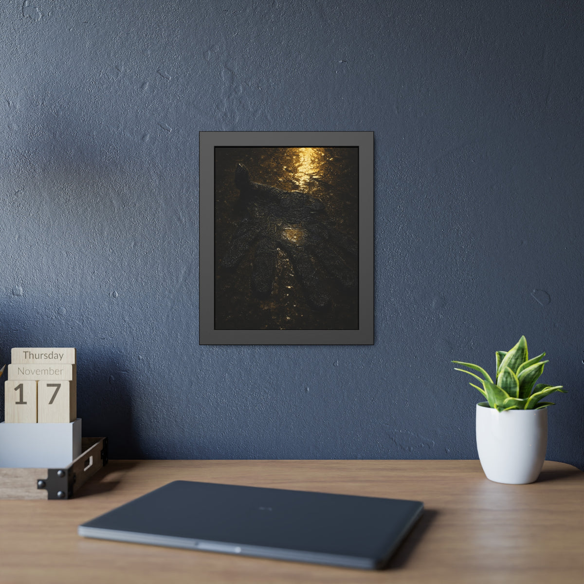 A flattened black glove pressed into wet asphalt beside a light streak. The Flattening, Study No. 1 by Garabaggio, framed fine art print hanging in a room.