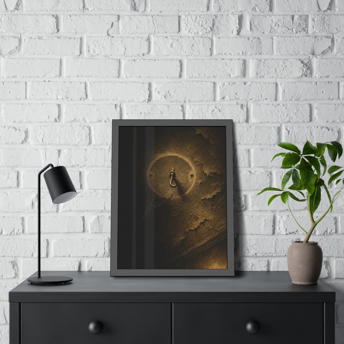 A small empty hook on a cracked ceiling, lit from one side. The Hook Without a Burden by Garabaggio, framed fine art print hanging in a room.