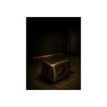 A scorched toaster on the ground in a dark corner, light on the wall. The Rejection at the Back Door by Garabaggio, fine art print, 12″ x 16″.