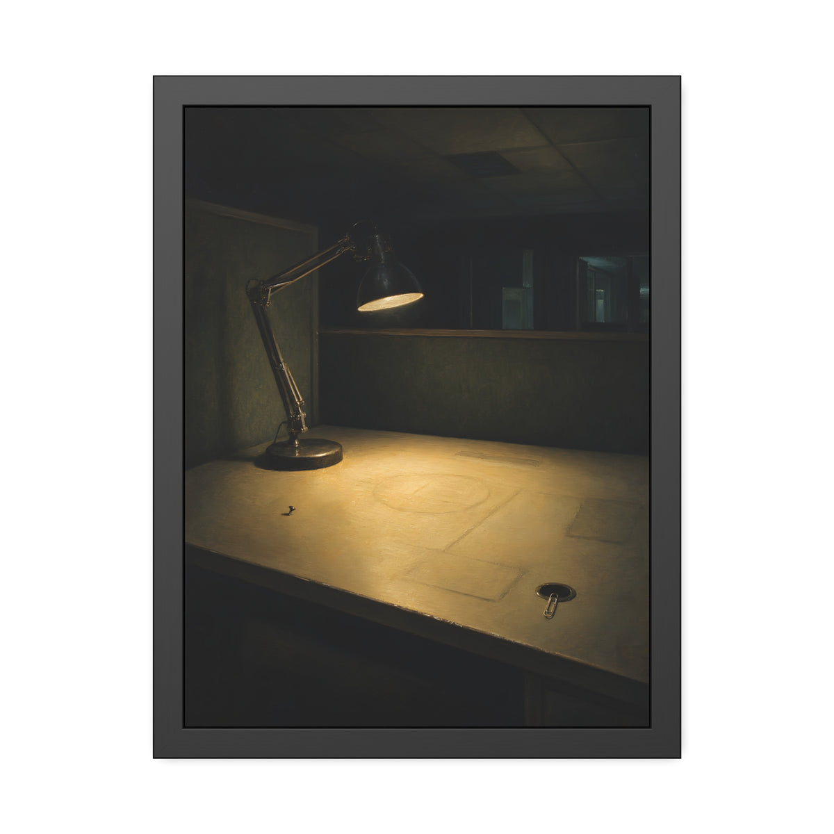 A lit desk lamp on an emptied office desk at night. The Desk Lamp Still Warm by Garabaggio, framed fine art print, 18″ x 24″.