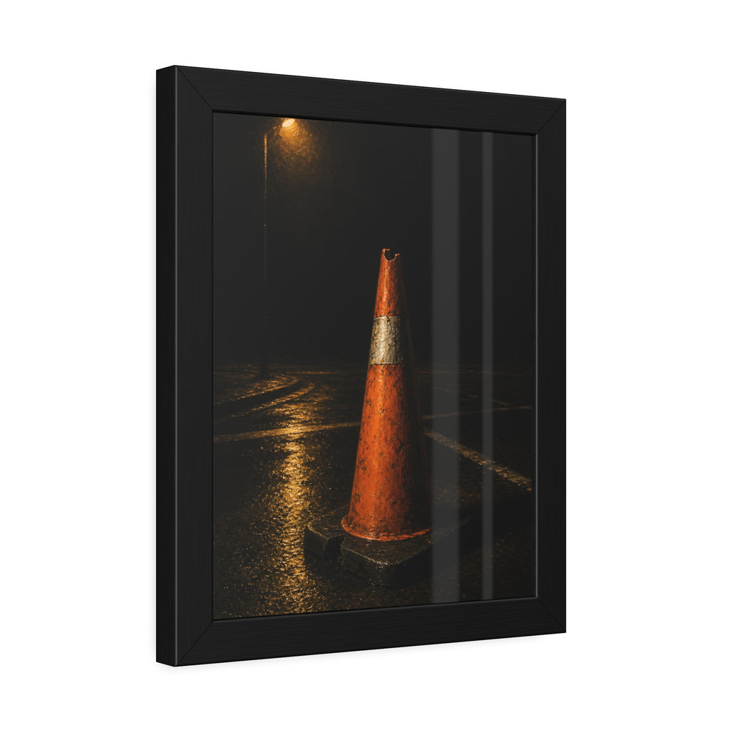 A battered orange traffic cone on wet asphalt under a street lamp. The Warning Without Danger by Garabaggio, framed fine art print hanging in a room.