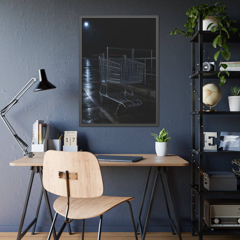 A shopping cart beside its corral on wet asphalt under a lot light. The Cart at the Corral by Garabaggio, framed fine art print hanging in a room.