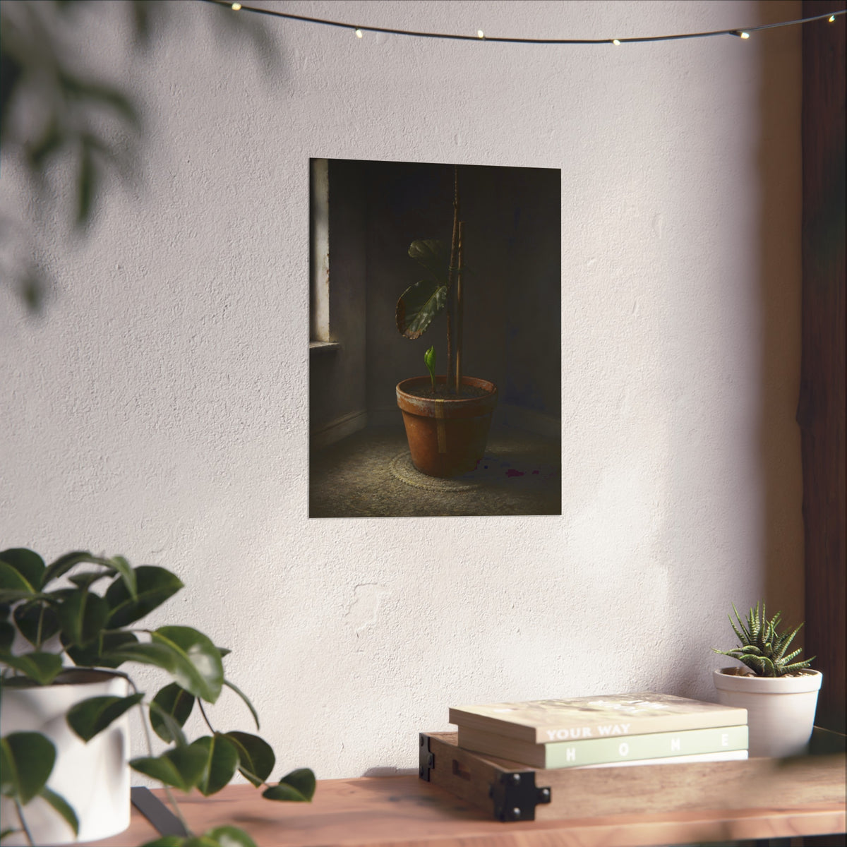 A potted plant down to two curled leaves and one new sprout by a window. The Corner by the Window Again by Garabaggio, fine art print hanging in a room.