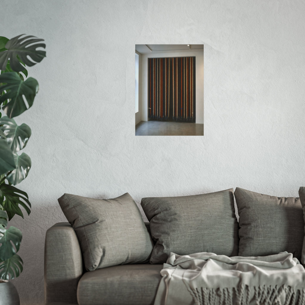 Hundreds of extension cords hung floor to ceiling across a bright white room. The Cord Curtain by Garabaggio, fine art print hanging in a room.