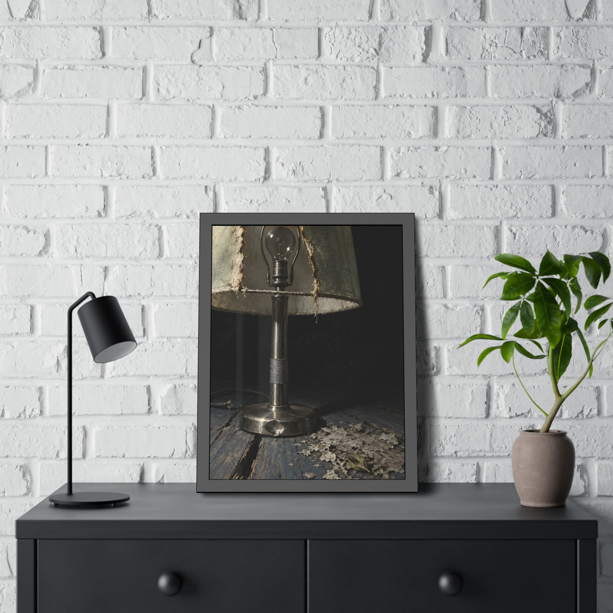 "The Bare Bulb": A Garabaggio Framed Print