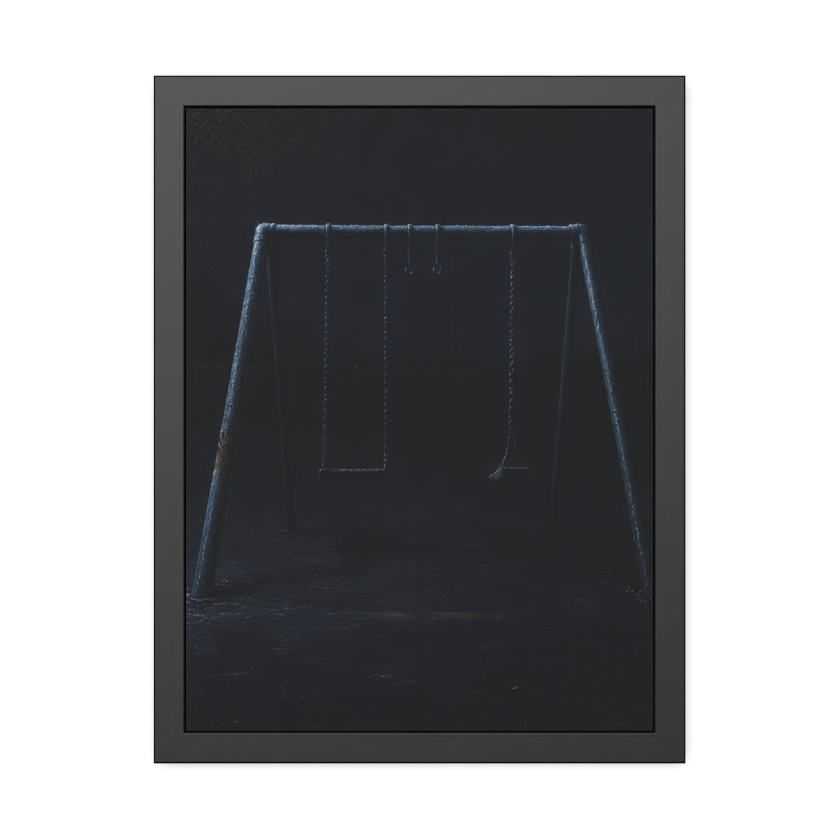 An empty swing set in near darkness with one seat twisted. The Fourth Hour: The Floodlights Cut by Garabaggio, framed fine art print, 18″ x 24″.