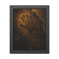 A glove shaped imprint left in cracked asphalt under warm light. The Assumption, or: What Remains by Garabaggio, framed fine art print, 11″ x 14″.