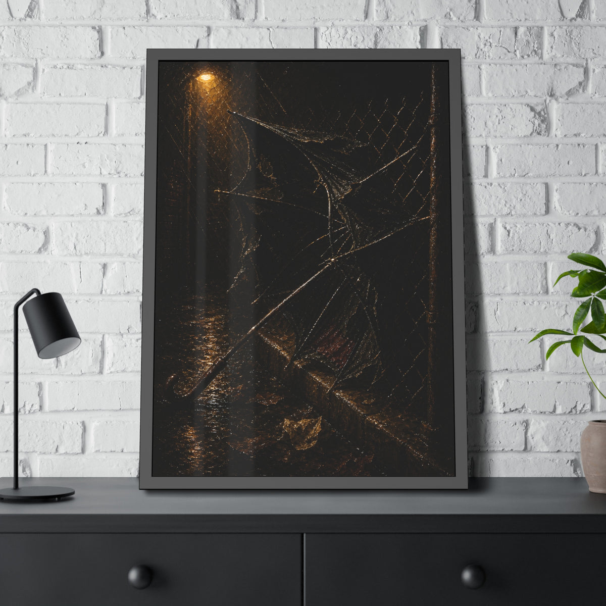 A broken umbrella pinned to a chain link fence under a rainy streetlamp. The Scourging by the Wind by Garabaggio, framed fine art print hanging in a room.