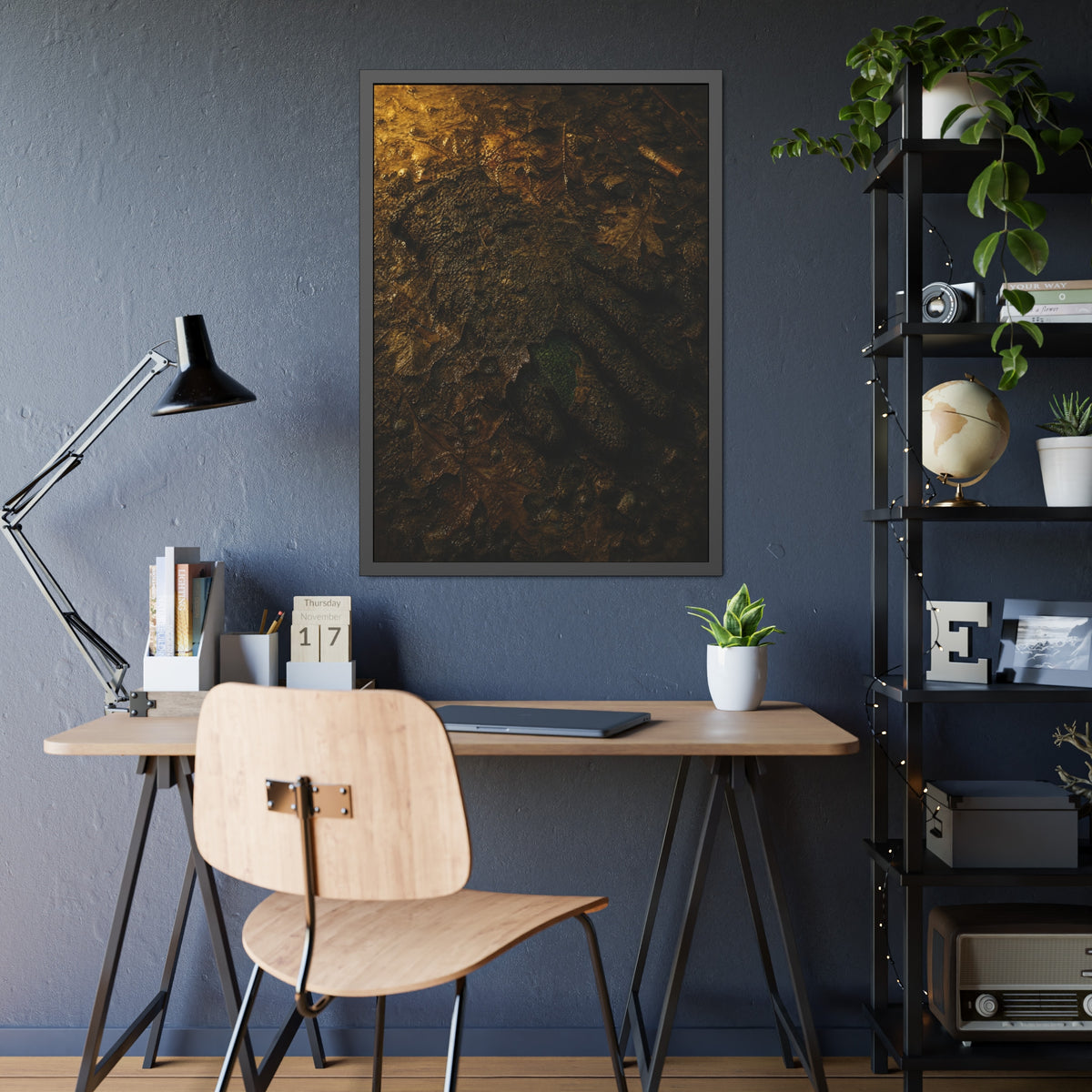 Wet mud and pressed oak leaves with a green scrap barely showing. The Reliquary of Mud and Leaf by Garabaggio, framed fine art print hanging in a room.