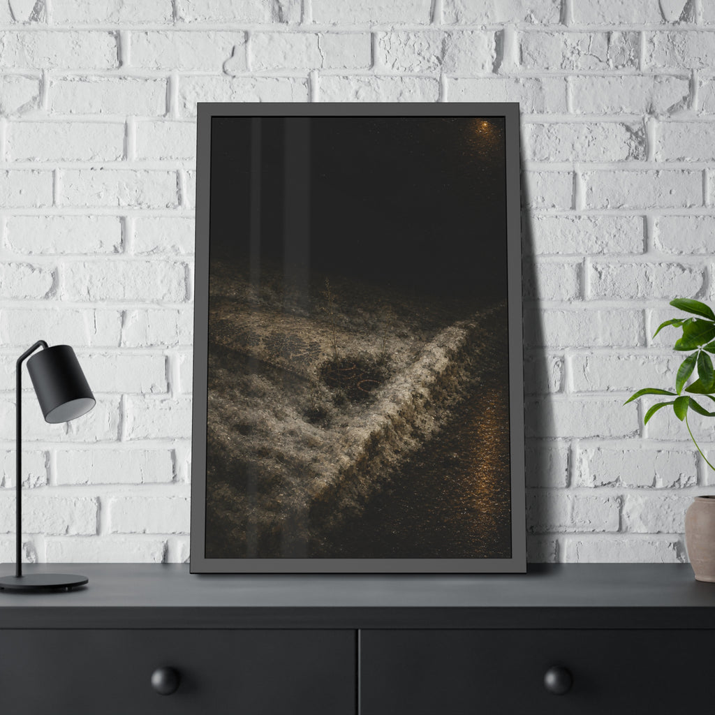 A discarded mattress half buried in snow, a distant streetlight behind. The White Burial by Garabaggio, framed fine art print hanging in a room.