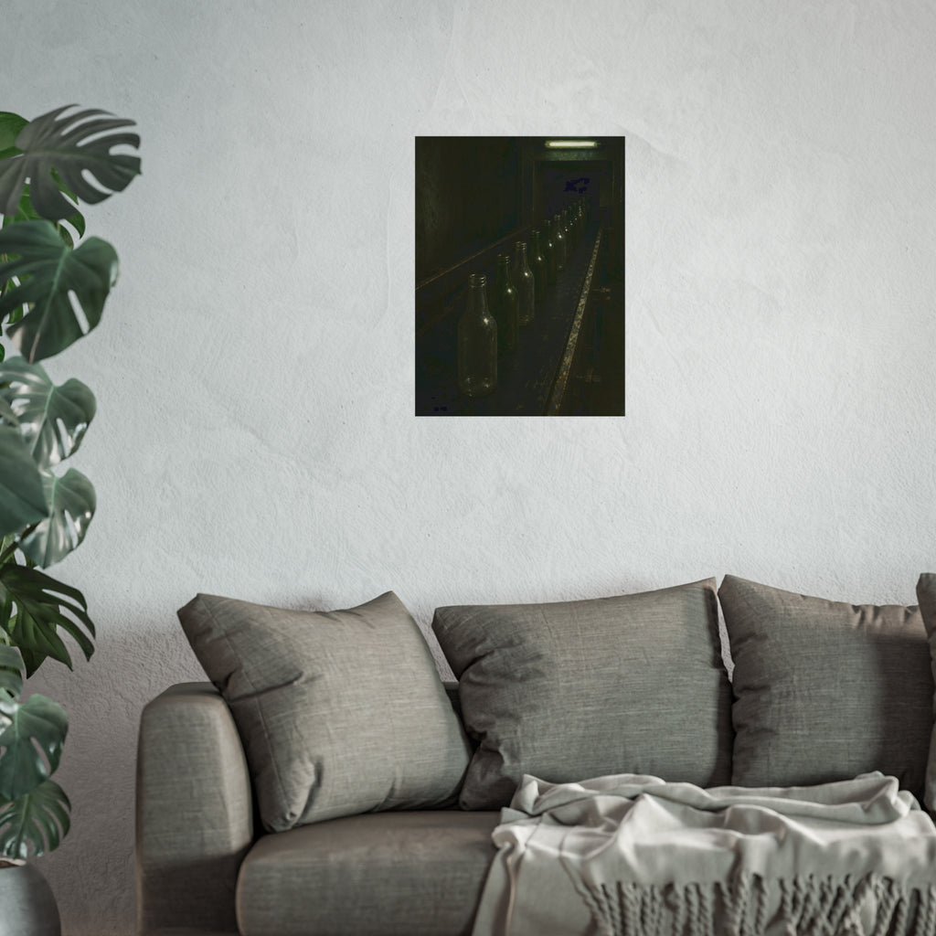Empty glass bottles in a line on a conveyor under one fluorescent tube. The Procession of Bottles by Garabaggio, fine art print hanging in a room.