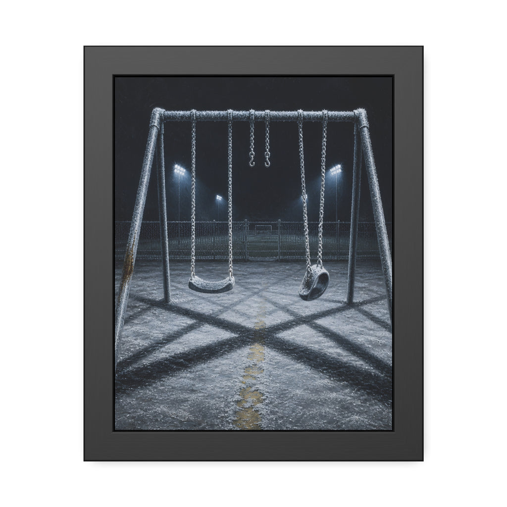 A frost covered swing set on empty asphalt under distant floodlights. The Third Hour: The Coldest Part by Garabaggio, framed fine art print, 11″ x 14″.