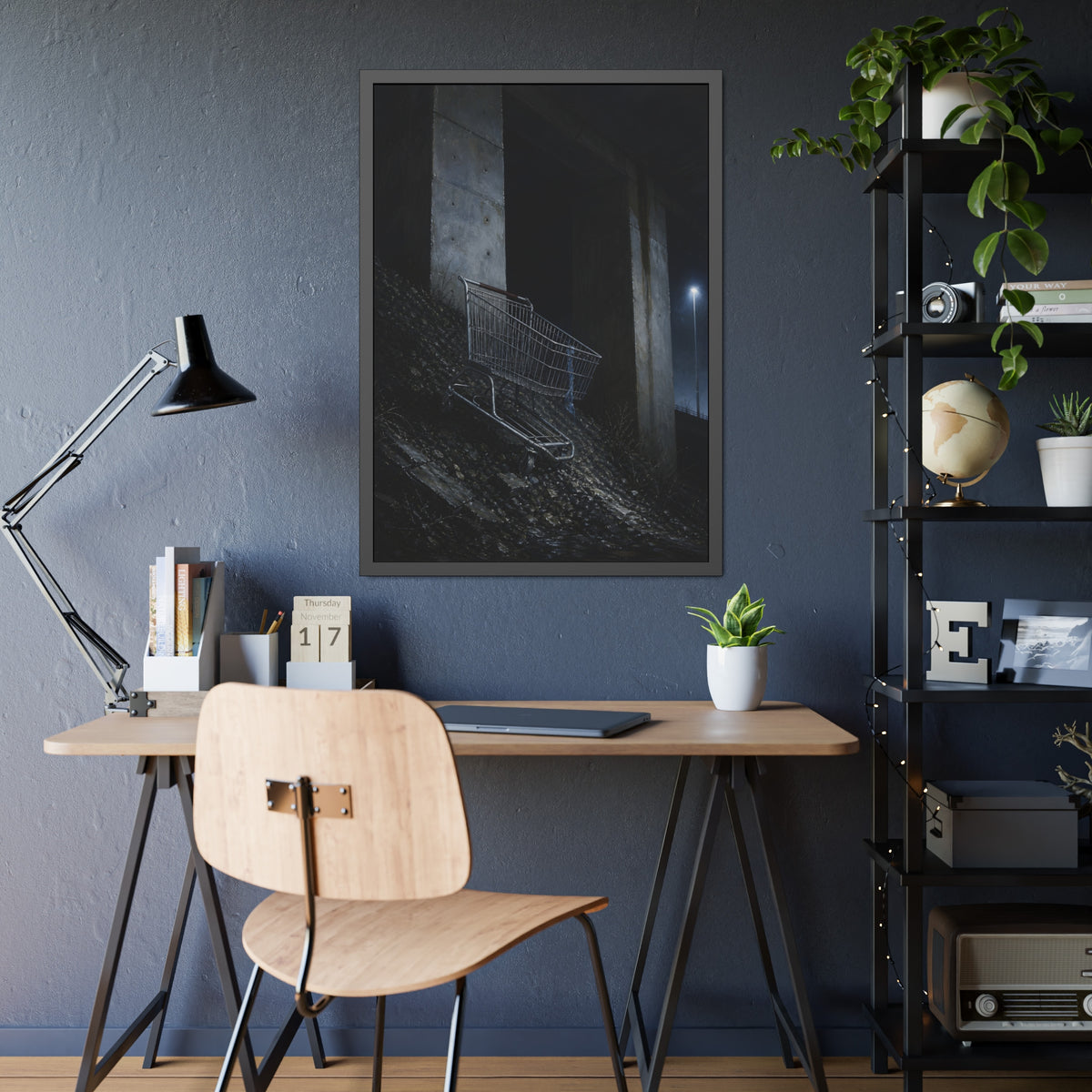 A shopping cart on a rocky slope under an overpass near a streetlamp. The Descent to the Underpass by Garabaggio, framed fine art print hanging in a room.