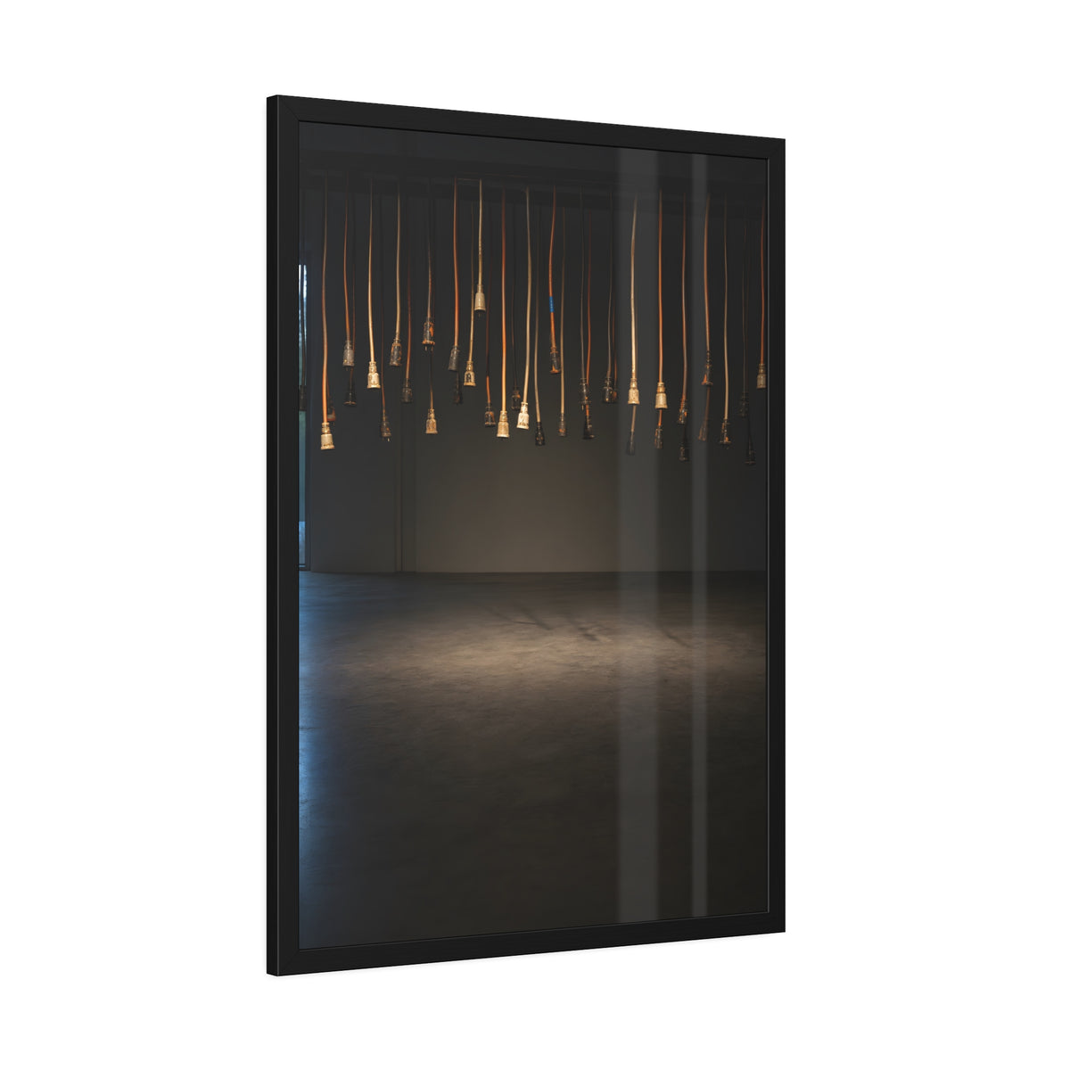 Extension cords hanging plug down from a ceiling in a dim room. All Ends, No Source by Garabaggio, framed fine art print hanging in a room.