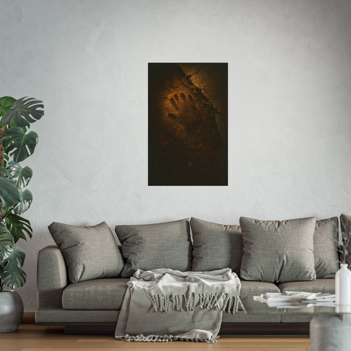 A glove shaped imprint left in cracked asphalt under warm light. The Assumption, or: What Remains by Garabaggio, fine art print hanging in a room.