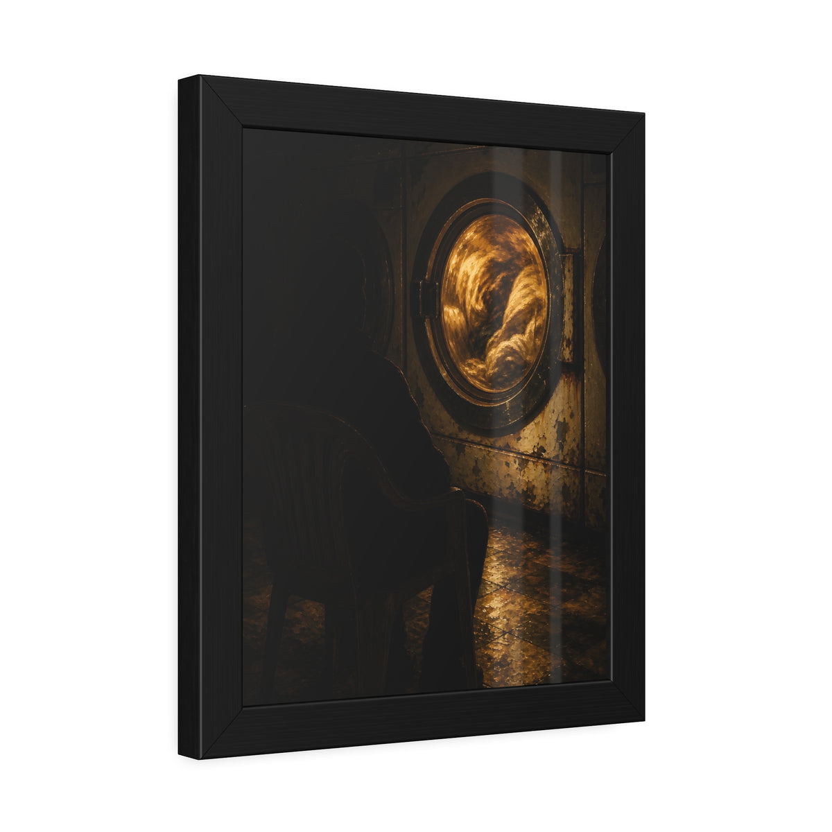 A person seated in a plastic chair facing a lit dryer drum. The Watcher in the Plastic Chair by Garabaggio, framed fine art print hanging in a room.