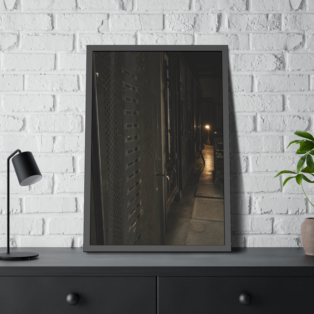 Rows of dark server cabinets with one work lamp glowing far down the aisle. Racks Without Light by Garabaggio, framed fine art print hanging in a room.
