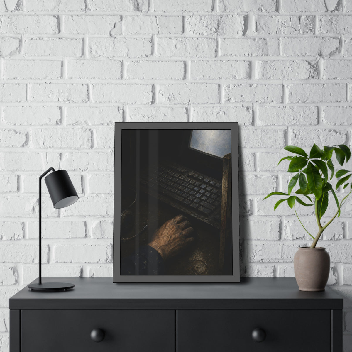 A hand on a mouse beside a grimy keyboard and a pale glowing screen. Login Before Dawn by Garabaggio, framed fine art print hanging in a room.