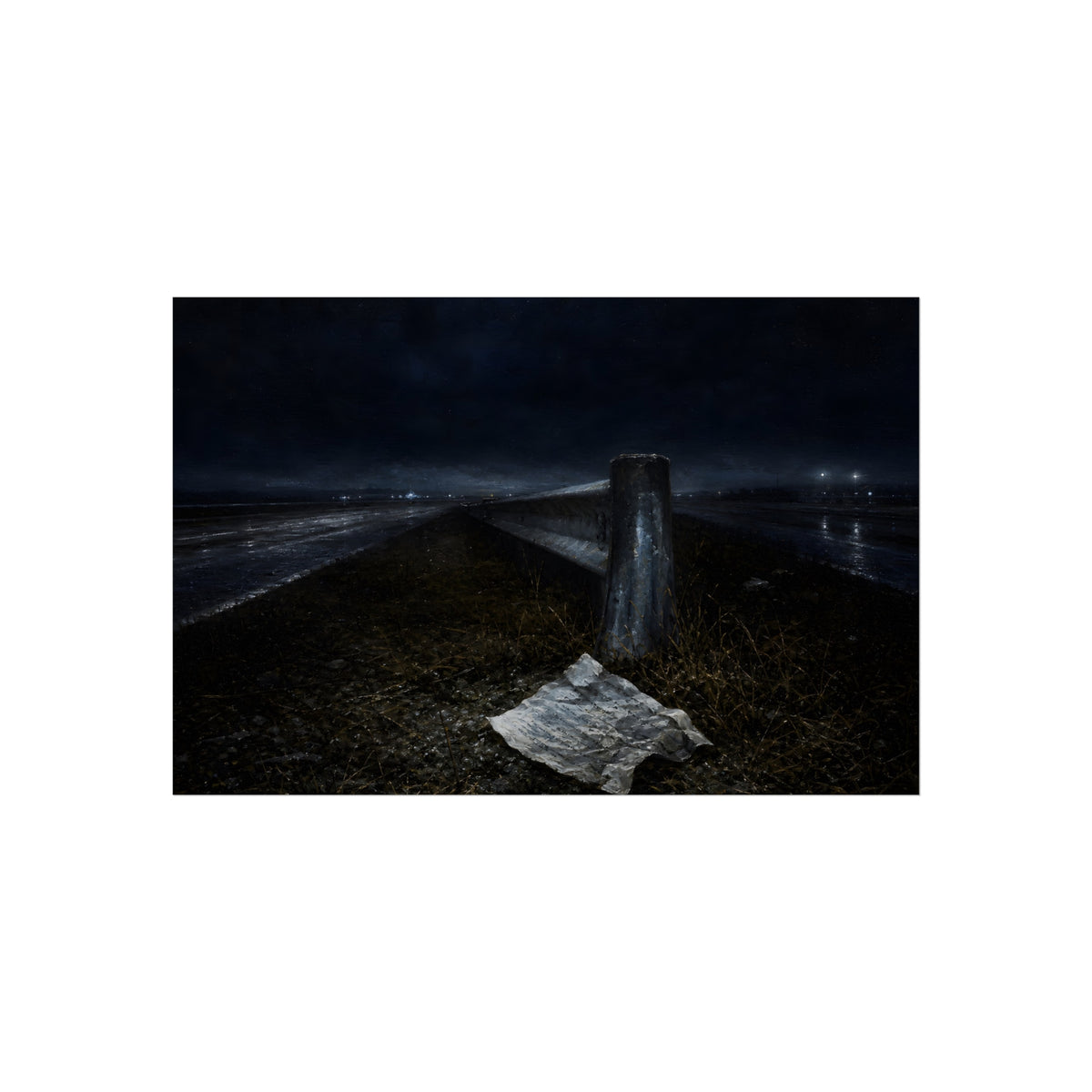 A sheet of paper on a grassy highway median beside a concrete post at night. The Resume on the Median by Garabaggio, fine art print, 36″ x 24″.
