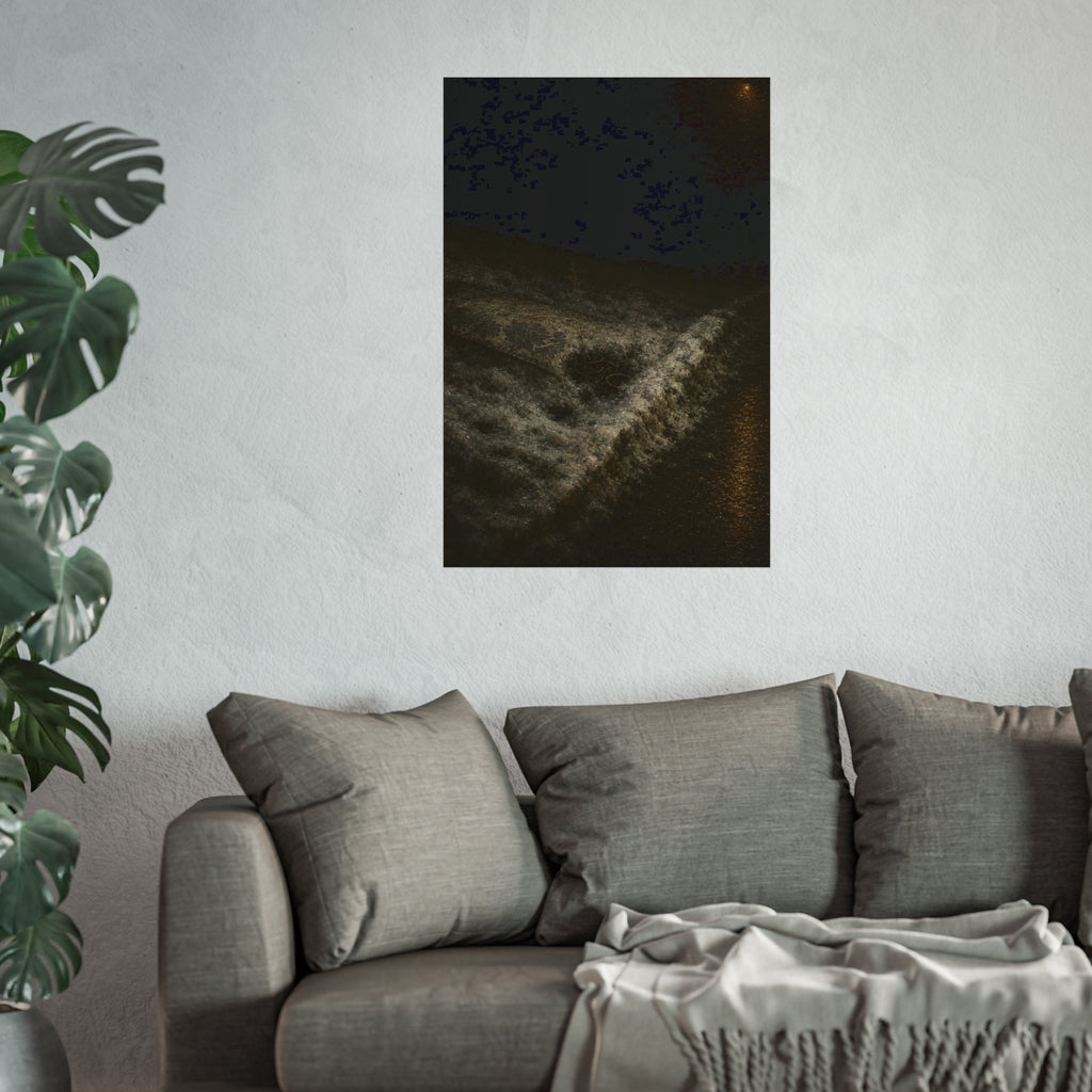 A discarded mattress half buried in snow, a distant streetlight behind. The White Burial by Garabaggio, fine art print hanging in a room.