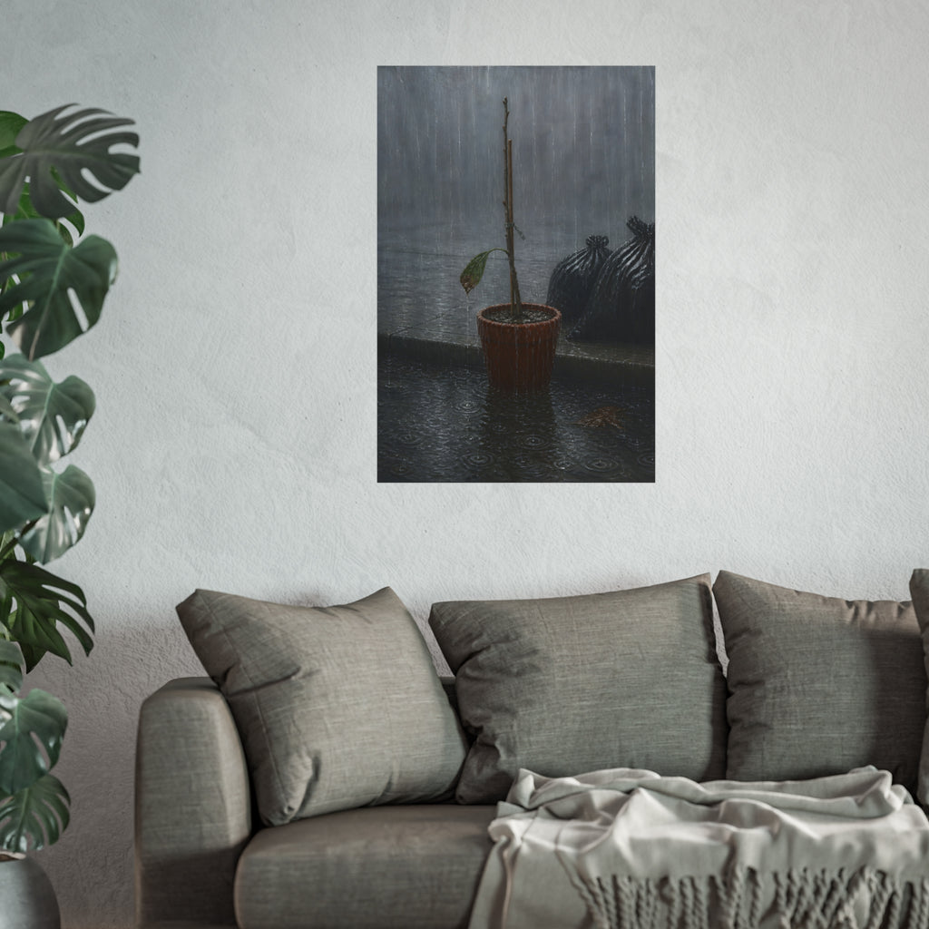 A bare stick in a clay pot on a curb in heavy rain beside trash bags. The Second Rain by Garabaggio, fine art print hanging in a room.