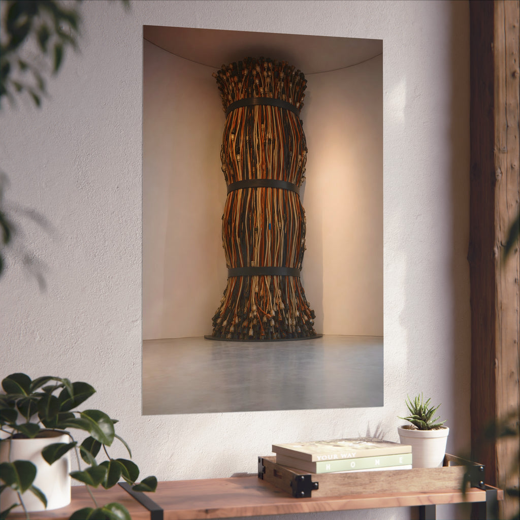 A tall column of bundled cords strapped in three places in a gallery corner. The Bundled Apse by Garabaggio, fine art print hanging in a room.