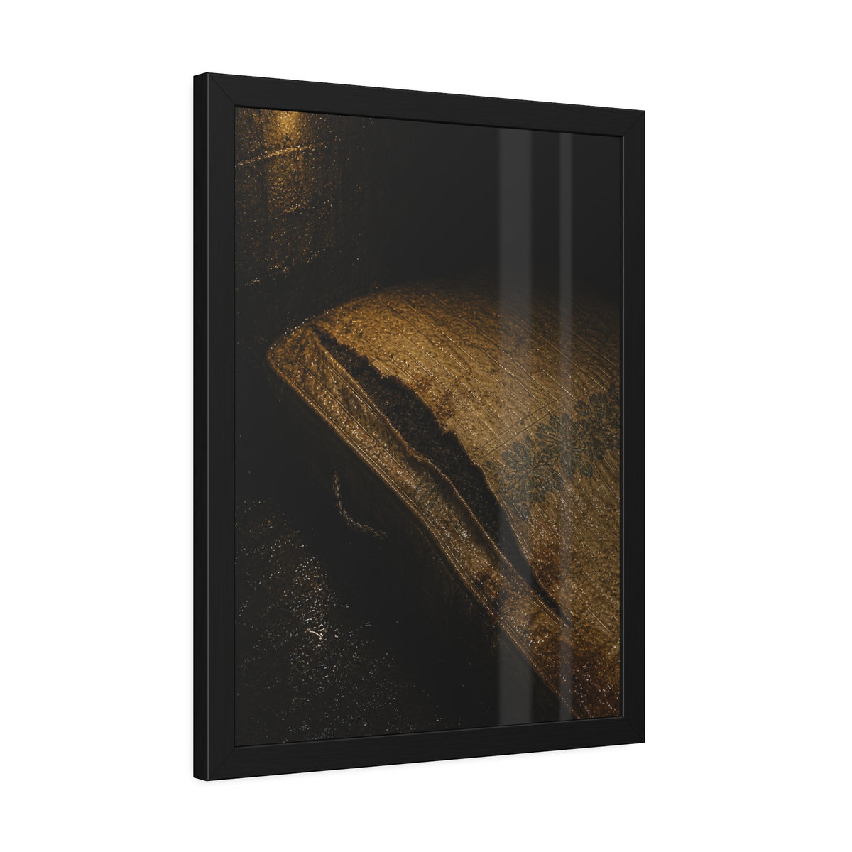 A mattress with its seam split open, lit warm against a dark wall. The Opening of the Ticking by Garabaggio, framed fine art print hanging in a room.