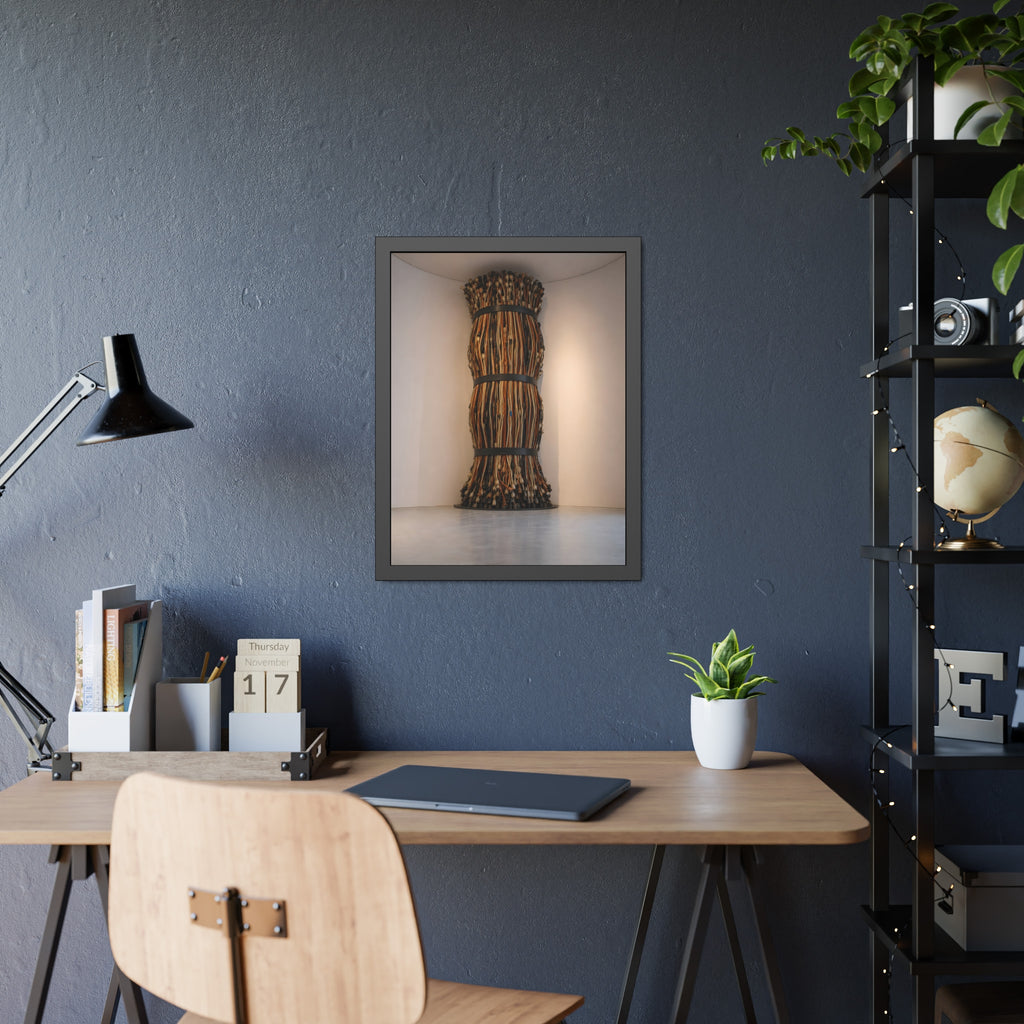 A tall column of bundled cords strapped in three places in a gallery corner. The Bundled Apse by Garabaggio, framed fine art print hanging in a room.