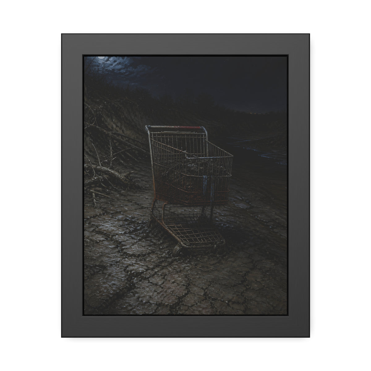 A rusted shopping cart sunk in cracked dried mud under a full moon. The Silting by Garabaggio, framed fine art print, 11″ x 14″.